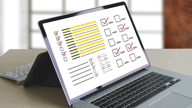 Using a personal cybersecurity checklist can help ensure you’re covering all of the most important cyber hygiene habits. Image shows a laptop with a checklist on the screen.